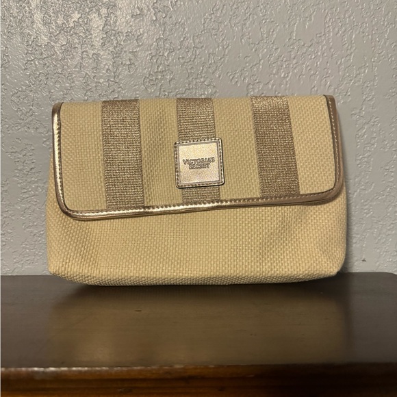 Victoria's Secret Handbags - Victoria's Secret Gold and Cream Clutch